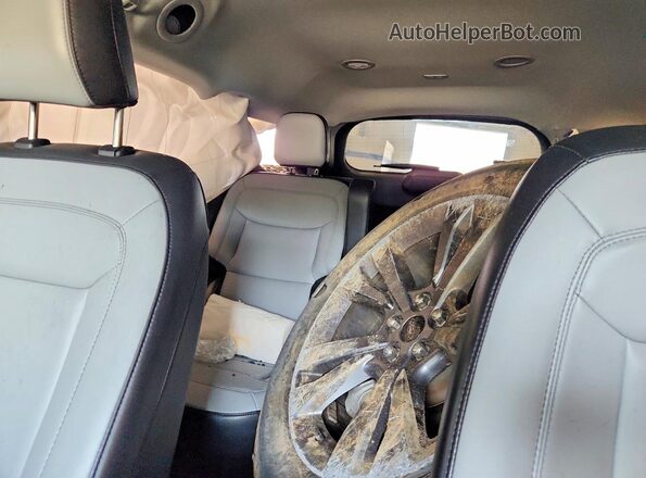 1FMSK8DH7MGB40900 2021 FORD EXPLORER Silver Rear seats view