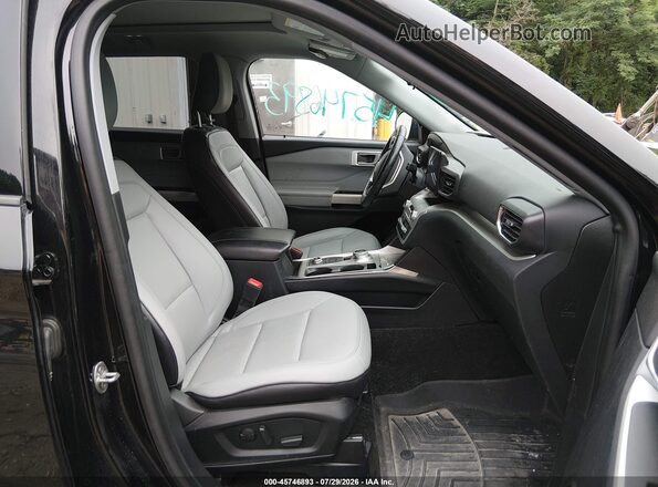 1FMSK8DH8MGA01018 2021 FORD EXPLORER Black Front interior view