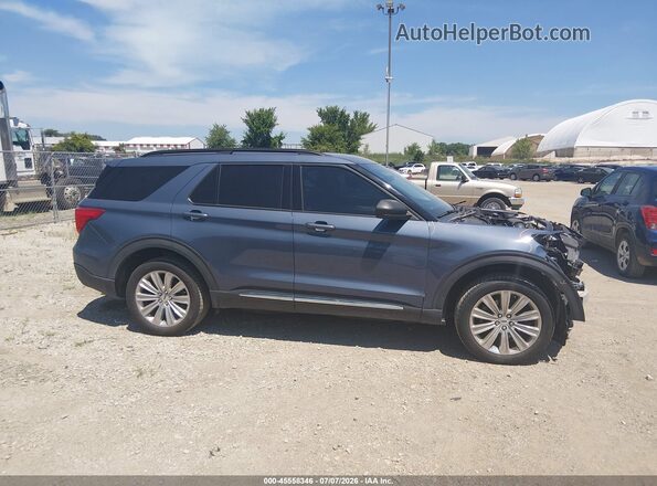 1FMSK8DH9MGB74160 2021 FORD EXPLORER Синий Вид задней части салона