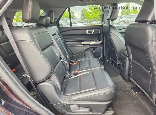1FMSK8DH9NGA53016 2022 FORD EXPLORER Black Rear interior view