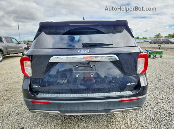 1FMSK8DH9NGA53016 2022 FORD EXPLORER Black Rear view