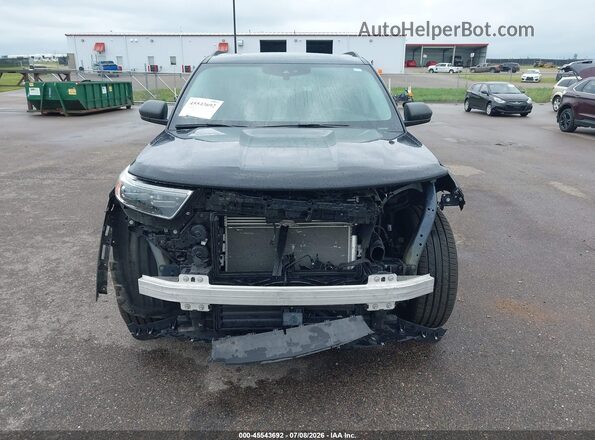 1FMSK8DH9PGC30117 2023 FORD EXPLORER Blue Vista interior trasera