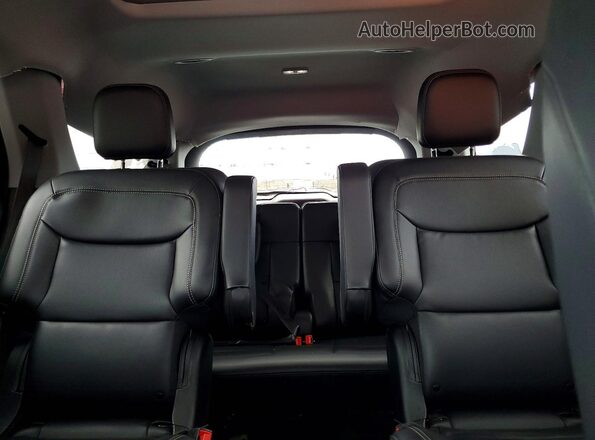 1FMSK8DHXRGA16448 2024 FORD EXPLORER Red Rear seats view