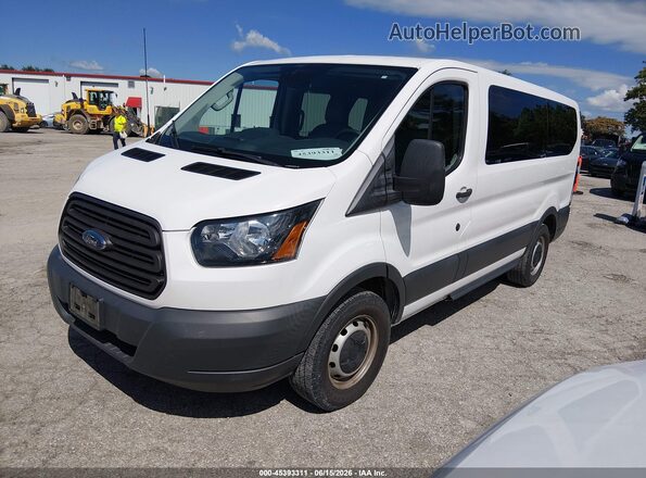 1FMZK1ZM1JKA99779 2018 FORD TRANSIT-150 White Vista tres cuartos delantera izquierda