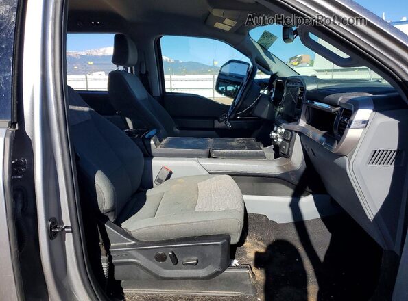 1FT6W1EV8PWG23182 2023 FORD F150 Silver Widok wnętrza z przodu