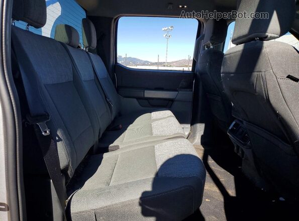 1FT6W1EV8PWG23182 2023 FORD F150 Silver Widok tylnych siedzeń