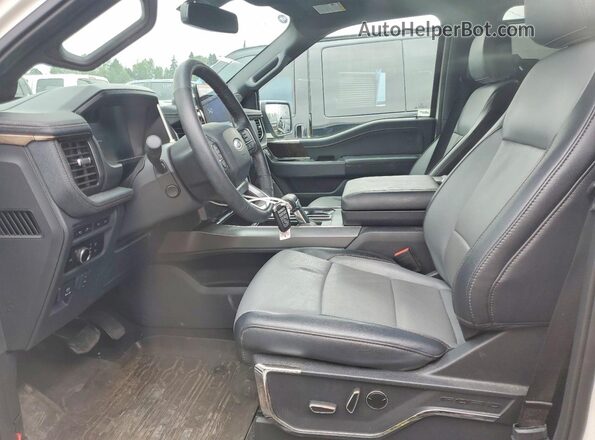 1FT6W1EV8PWG60037 2023 FORD F150 Белый Вид салона спереди