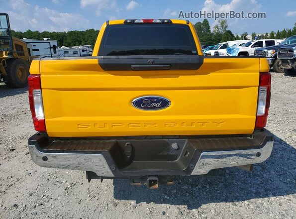 1FT7W2A69KEE77012 2019 FORD F250 Yellow Вид ззаду
