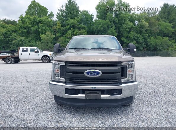 1FT7X2B61KEF41250 2019 FORD F-250 Gold Вид задньої частини салону