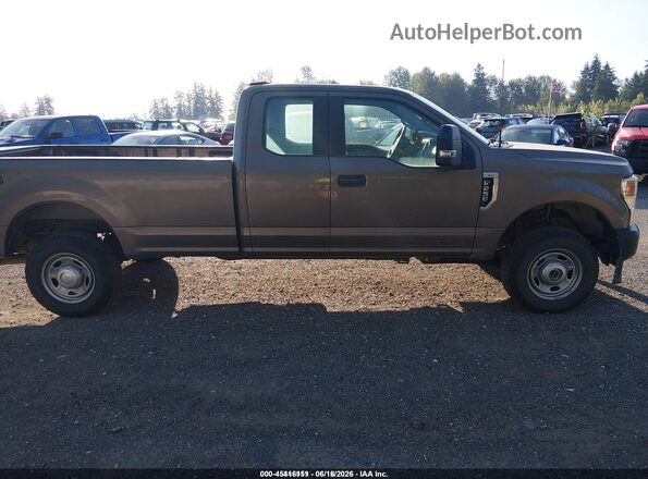 1FT7X2B69NEE46049 2022 FORD F-250 Gold Սալոնի հետևի տեսք