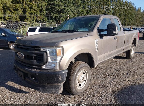 1FT7X2B69NEE46049 2022 FORD F-250 Gold Առջևի ձախ երեք քառորդ տեսարան