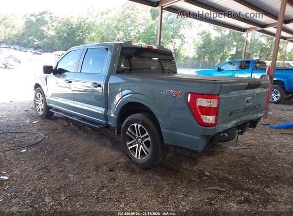 1FTEW1C58PKE38104 2023 FORD F150 Blue Tył lewy