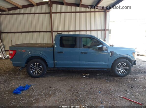 1FTEW1C58PKE38104 2023 FORD F150 Blue Widok wnętrza 360 stopni