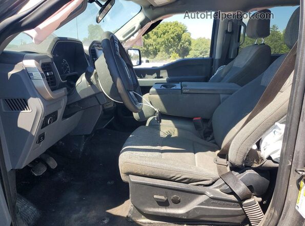 1FTEW1C85PKD44384 2023 FORD F150 Серый Вид салона спереди