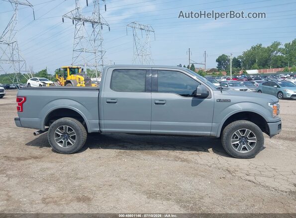 1FTEW1E41KFB44470 2019 FORD F150 Gray Vista interior trasera