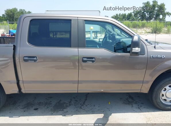 1FTEW1E53JFD05117 2018 FORD F150 Brown Vista interior trasera