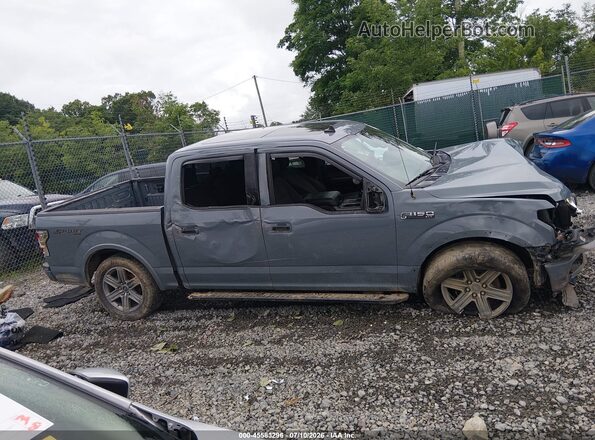 1FTEW1E55KFC18000 2019 FORD F150 Gray Widok wnętrza z tyłu