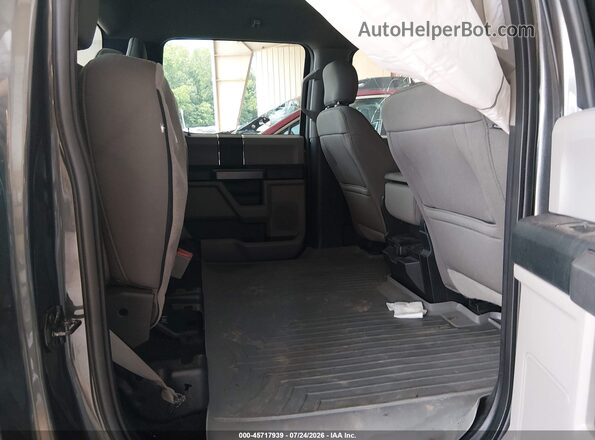 1FTEW1E56JFA07631 2018 FORD F150 Black VIN կոդի պիտակի տեսք