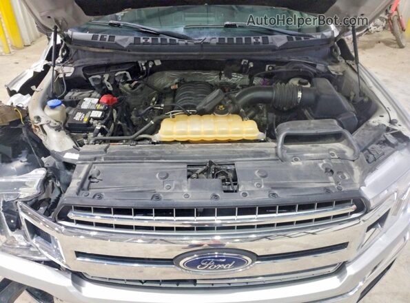 1FTEW1E57JKC61310 2018 FORD F150 Silver Vista interior trasera