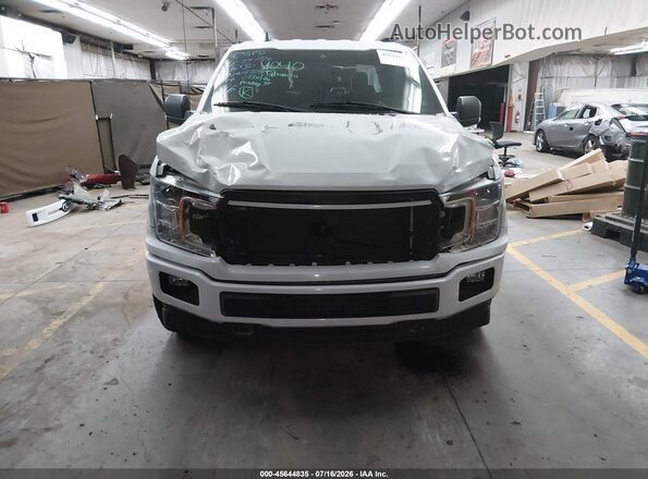 1FTEW1E57KKC04705 2019 FORD F150 White Вид задньої частини салону
