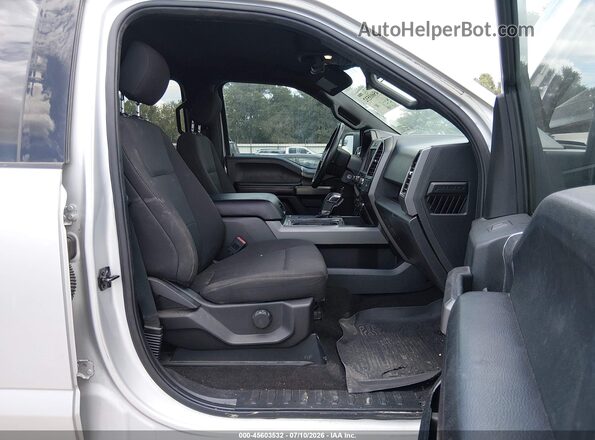 1FTEW1E57KKC97337 2019 FORD F150 Серебряный Вид салона спереди