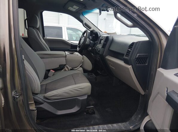 1FTEW1E82HKE26331 2017 FORD F150 Коричневый Вид салона спереди