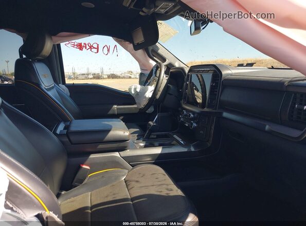 1FTEW1E83PFB34078 2023 FORD F150 Gray Vista interior delantera