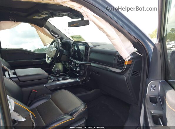 1FTEW1E84PFD30580 2023 FORD F150 Blue Вид салону спереду