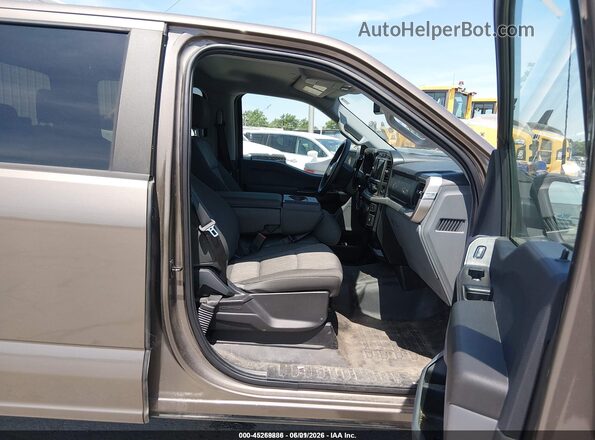 1FTEW1EB1MKE70861 2021 FORD F150 Коричневый Вид салона спереди