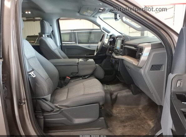 1FTEW1EB5MKE70846 2021 FORD F150 Brown Вид салону спереду