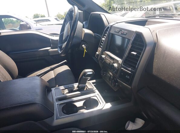 1FTEW1EP2KFB61997 2019 FORD F150 Gray Вид салону спереду