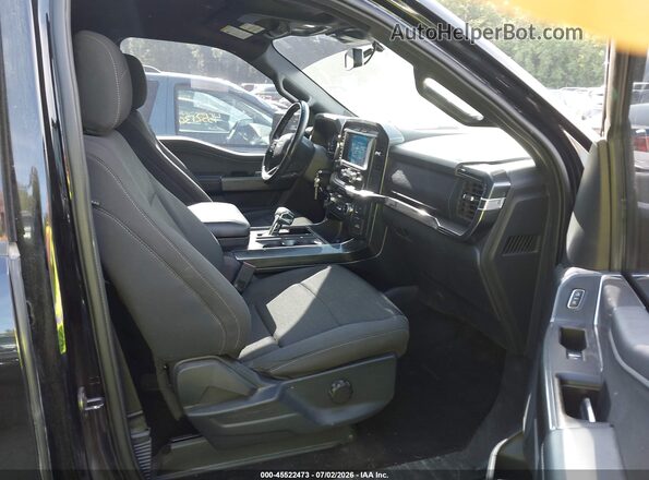 1FTEW1EP2NKD65744 2022 FORD F150 Black Widok wnętrza z przodu