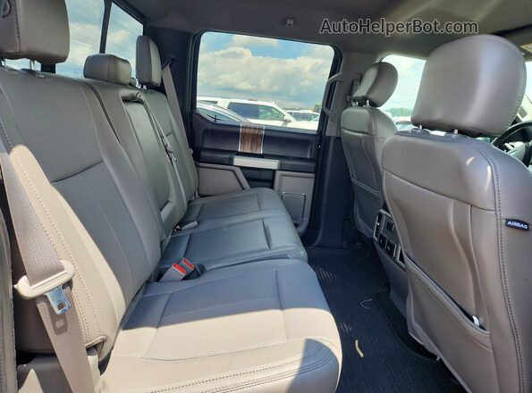 1FTEW1EP3JKD14599 2018 FORD F150 Black Vista de los asientos traseros