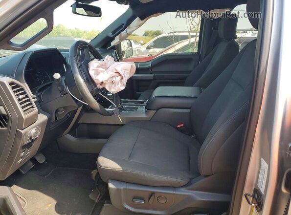 1FTEW1EP3KFA13180 2019 FORD F150 Silver Widok wnętrza z przodu