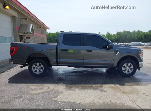 1FTEW1EP4NKE05841 2022 FORD F150 Gray Vista interior trasera