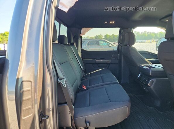 1FTEW1EP5PFB09402 2023 FORD F150 Silver Vista de los asientos traseros