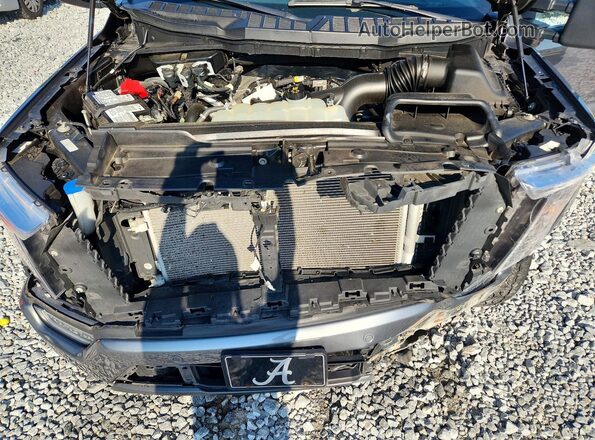 1FTEW1EP5PFB09402 2023 FORD F150 Silver Vista interior trasera