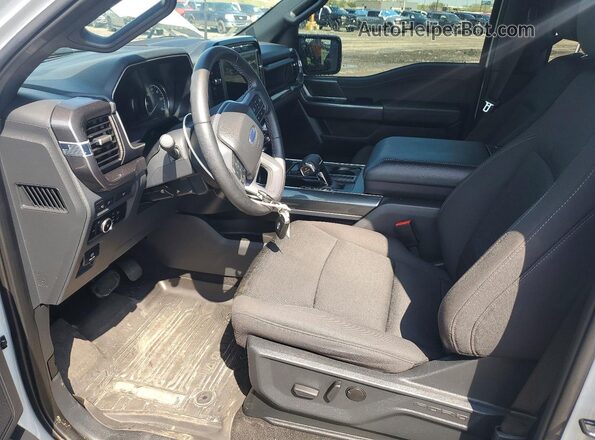 1FTEW1EP6PFD32578 2023 FORD F150 Gray Vista interior delantera
