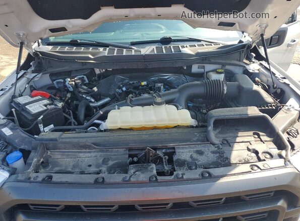 1FTEW1EP6PFD32578 2023 FORD F150 Gray Vista interior trasera