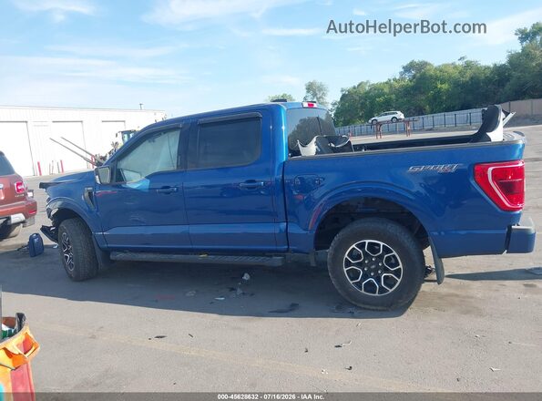 1FTEW1EP6PKF06415 2023 FORD F150 Blue Սալոնի հետևի տեսք