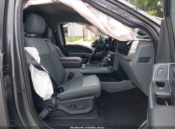 1FTEW1EP6PKF94463 2023 FORD F150 Gray Вид салону спереду