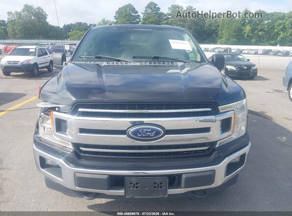 1FTEW1EP7JFD18597 2018 FORD F150 Black Vista del cuadro de instrumentos