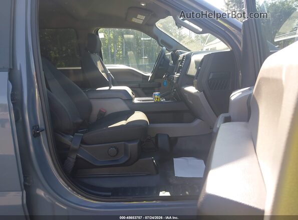 1FTEW1EP8LKE68521 2020 FORD F150 Серый Вид салона спереди