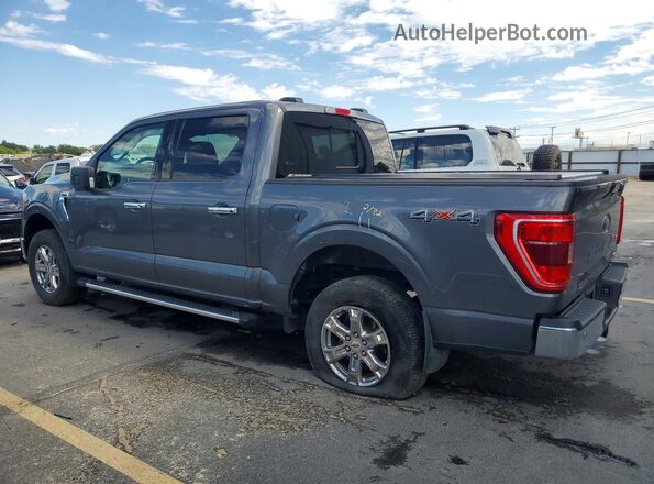 1FTEW1EP8PKG23705 2023 FORD F150 Gray Trasero izquierdo