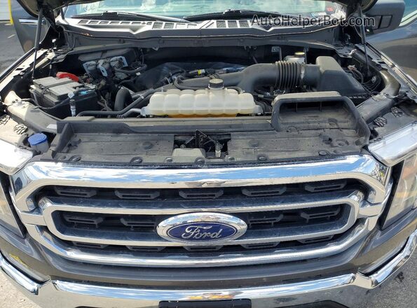 1FTEW1EP8PKG23705 2023 FORD F150 Gray Vista interior trasera