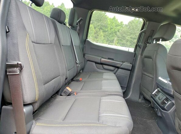 1FTEW2KP5RKF19704 2024 FORD F150 Gray Vista de los asientos traseros