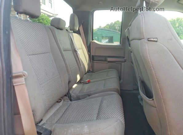 1FTEX1EP0JKG07793 2018 FORD F150 White Vista de los asientos traseros