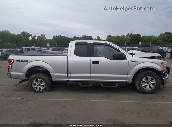1FTEX1EP1JFA53382 2018 FORD F150 Silver Vista interior trasera