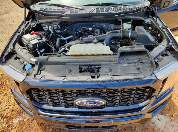 1FTEX1EP1PKF80290 2023 FORD F150 Blue Widok wnętrza z tyłu