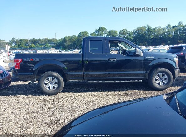 1FTEX1EP3JFB05725 2018 FORD F150 Black Vista interior trasera